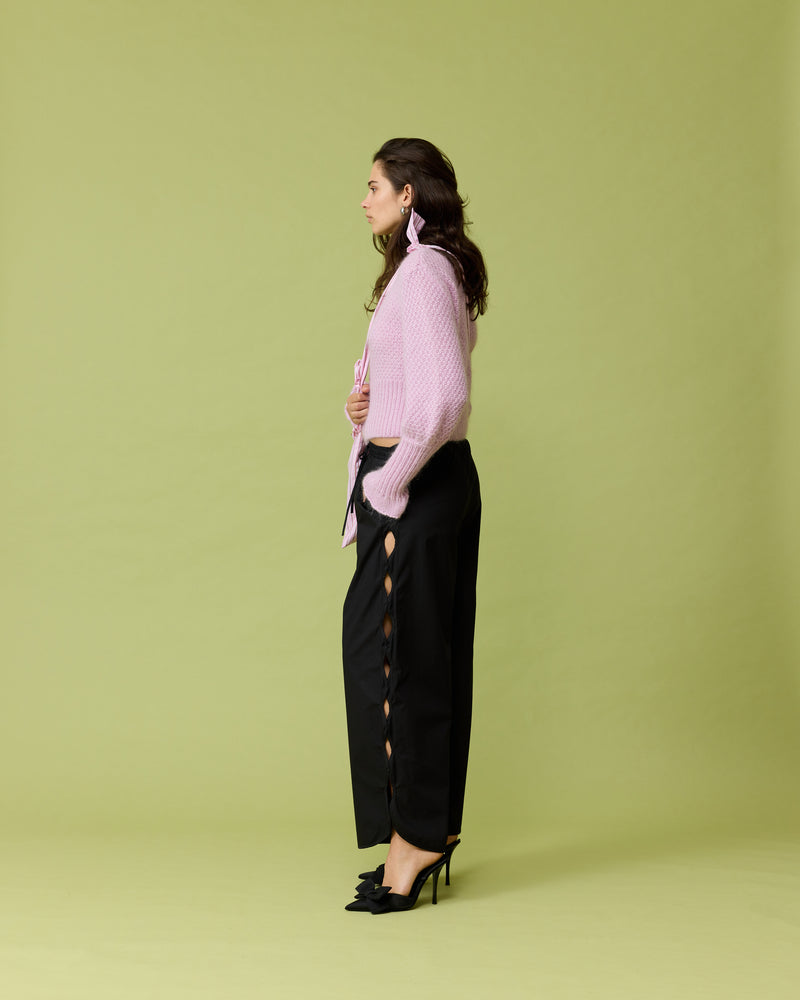 TRULLI PANT BLACK | Mid-waist cotton pant designed in a black cotton. Features wave cut-outs down the outside of the legs, making these a fun piece for your wardrobe.