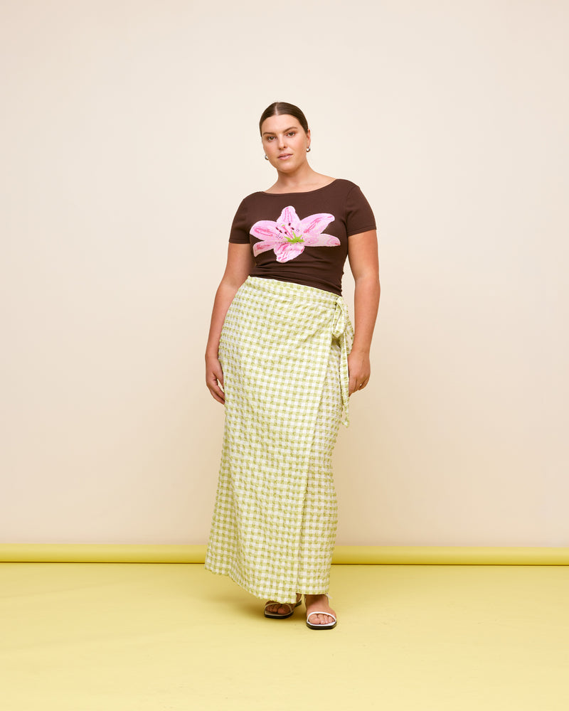 PRISM MIDI SKIRT LIME GINGHAM | Wrap midi skirt designed in a seersucker textured lime gingham. This skirt is versatile in that it can be worn low or high-waisted, depending on how you tie it.