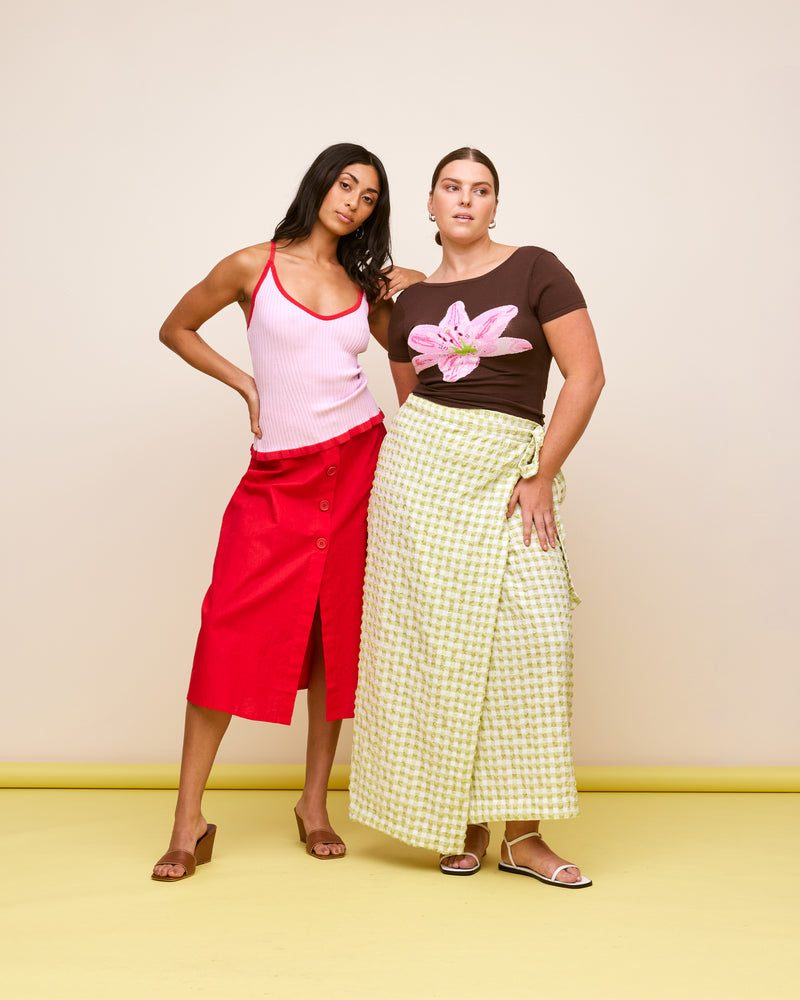 RINA TANK PINK CHERRY | Ribbed knitted tank top designed in a contrasting pink and cherry colour way. This staple tank can be worn many ways by adjusting the straps, giving you 4 options in 1.