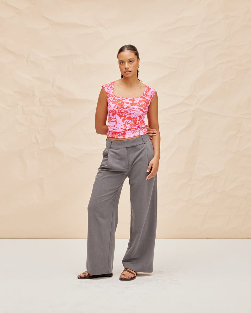 RUE TROUSER CHARCOAL | Straight leg mid-waist suit trouser with a flat waistband and belt loops. These pants are versatile in that they can we be worn casual with a baby tee, or formal with...