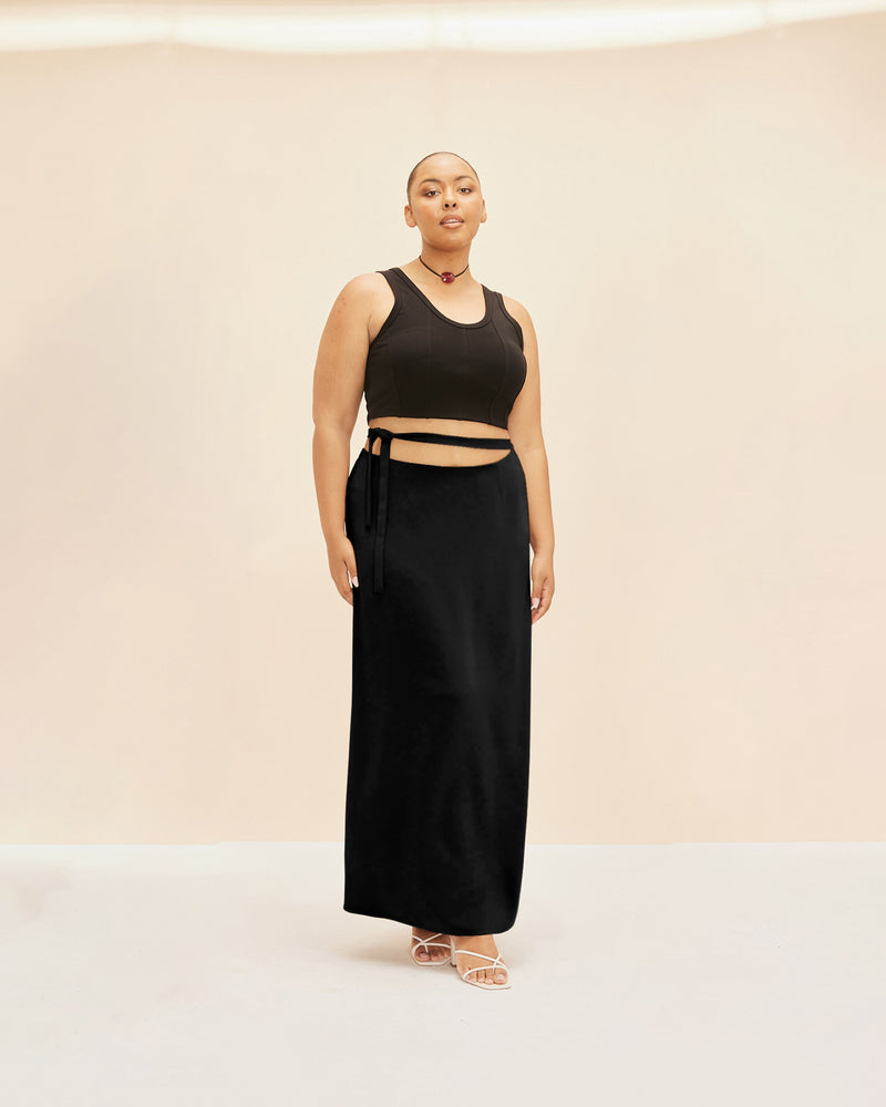 FIREBIRD TIE MAXI SKIRT BLACK | Tie waist maxi skirt cut in our signature Firebird fabric that can be tied to sit low, mid or high waisted. Elevated by the waist tie, this piece is a...