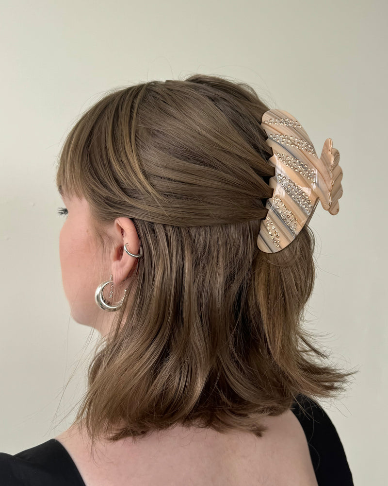 WAVE SPARKLE HAIR CLAW NATURAL STRIPE | Natural striped hair claw with feature sparkle detailing, this is a staple accessory for summer - perfect for beach hair. Holds half a head of hair and is comfortable enough to...