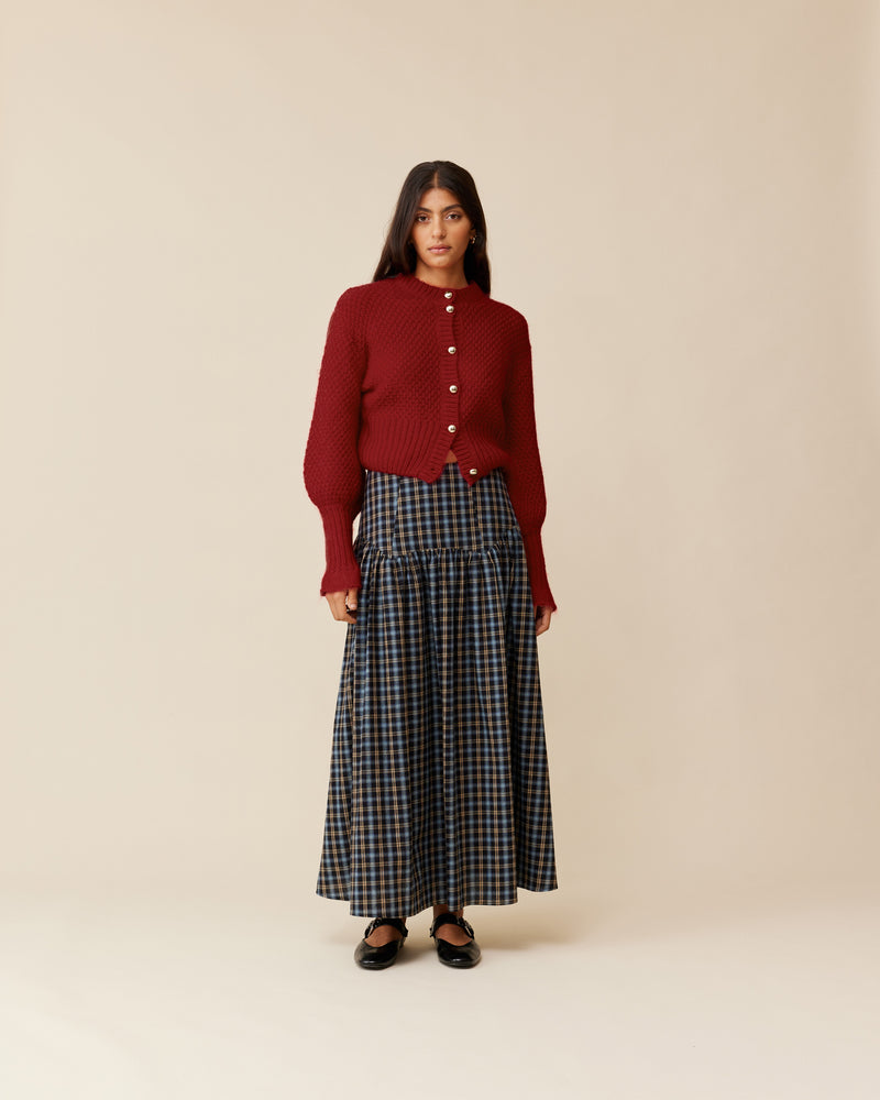 MATILDA CARDIGAN PAPRIKA | Button-down cardigan with gold metallic dome buttons and a slightly puff-shouldered silhouette. Features an exaggerated flute cuff crafted in a chunky mohair and wool blend.