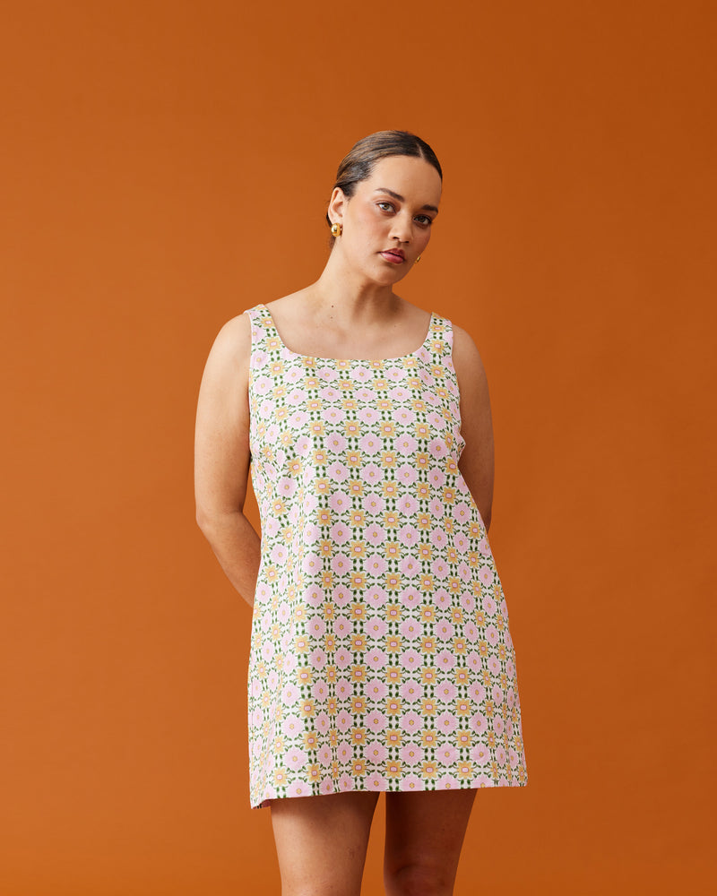 CECE TUNIC MINI DRESS MOSAIC | Shift-style mini dress designed in a pink mosaic printed drill. This dress has a square, scooped neckline with wider straps that will hide any straps underneath. 
