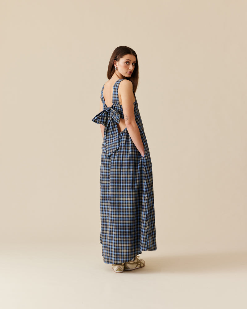 MARGIE TIE-BACK MAXI DRESS BLACK TARTAN | Cotton maxi dress with a square band bust. The skirt falls into a ruffled tier hem with an exposed back and bow tie closure.
