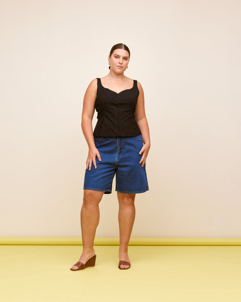 SOLAR RELAXED SHORT INDIGO | Vintage inspired high waisted short designed in an indigo mid-weight cotton denim. Sitting slightly A-line and offering a longer length fit, these shorts sit relaxed and easy in the warmer...