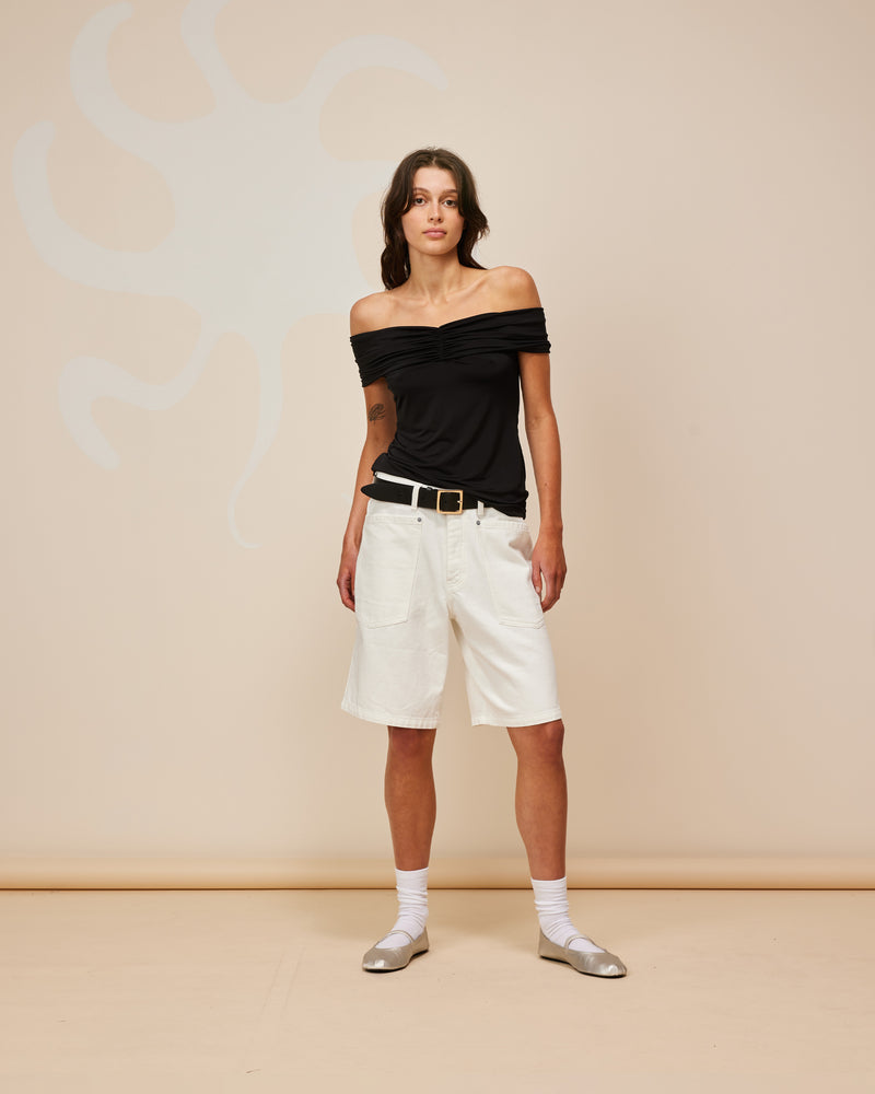 MERCI DENIM SHORT WHITE | Long-line denim short designed in a crisp white denim. These shorts have large feature pockets which add to the baggy, cargo style.