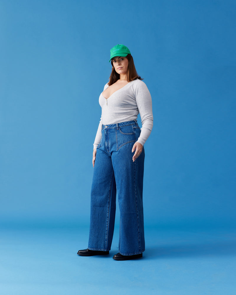 CLOVER JEAN INDIGO | The Clover Jean is the classic high waisted flared jean in an indigo denim wash. Retro four pocket detailing with contrast top stitching. Made in a soft denim with light...