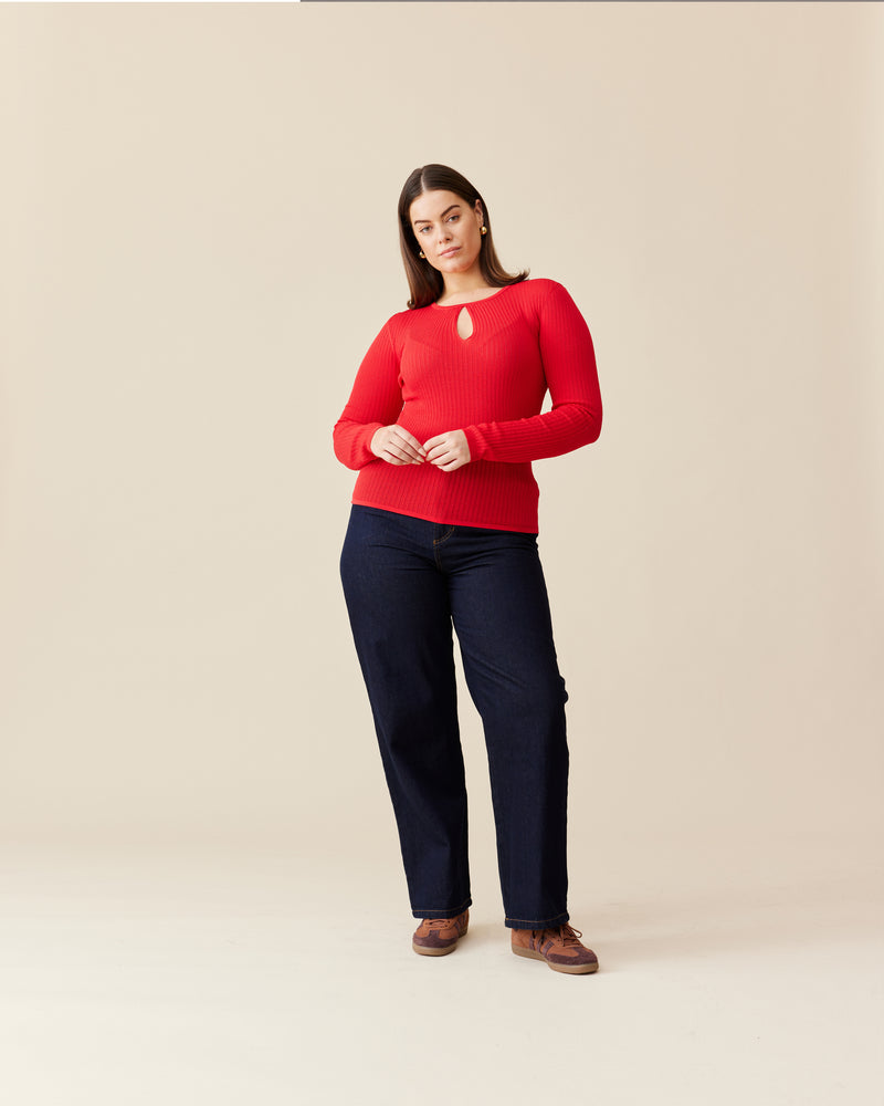 WREN KNIT LONG SLEEVE CHERRY | A RUBY take on a staple knit top. Designed in a cherry red ribbed knit, this long sleeve is fitted to the form with a keyhole detail that takes this...