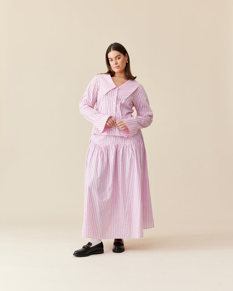 EDDIE SHIRT PINK RED STRIPE | A RUBY spin on a classic shirt shape, meet Eddie, a pink and red striped shirt that will bring fun into your wardrobe. Features a close fit that nips in...