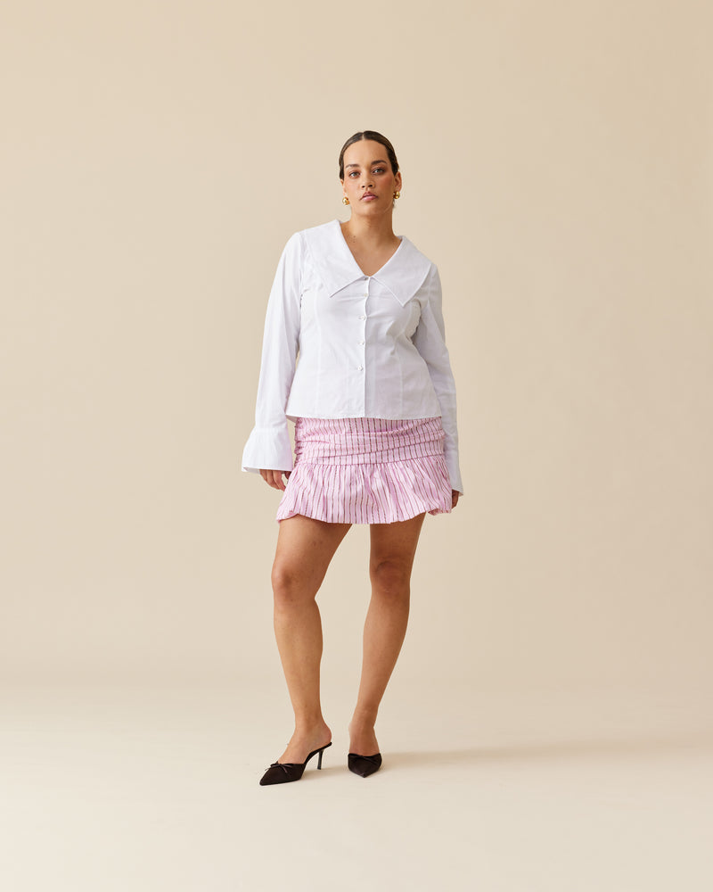 EDDIE MINI SKIRT PINK RED STRIPE | We've seen you styling your Eddie Bodice as a skirt, and we loved it so much we decided to make it into an actual skirt! Features an a-line 'puff' hem,...