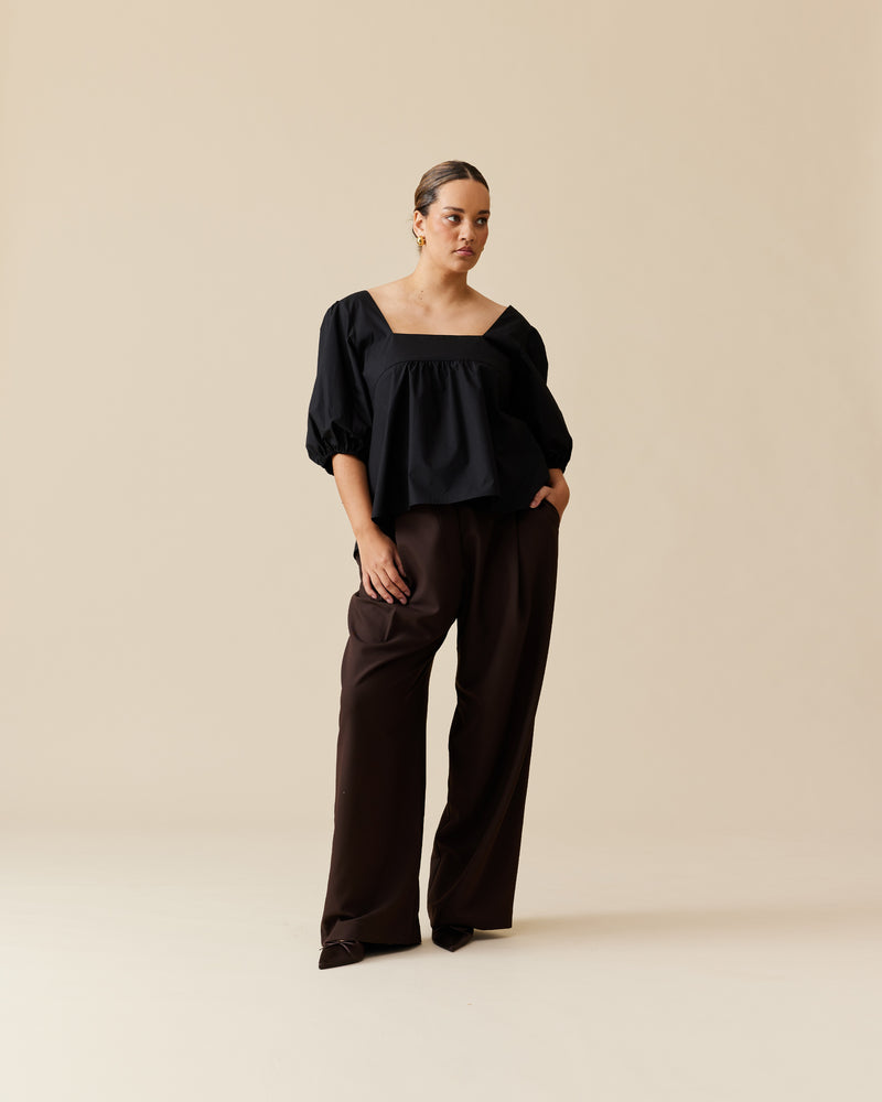 RUE TROUSER JAVA | Straight-leg mid-waist suit trouser with a flat waistband and belt loops. These pants are versatile in that they can be worn casual with a baby tee, or formal with the...