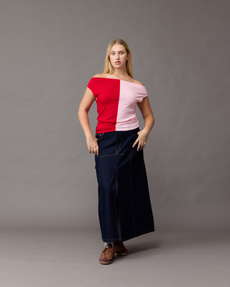 KURT DENIM SKIRT UNWASHED | A-line basque style skirt, design in a soft raw denim. This skirt has contrast stitching, pockets and a front split for ease of movement.