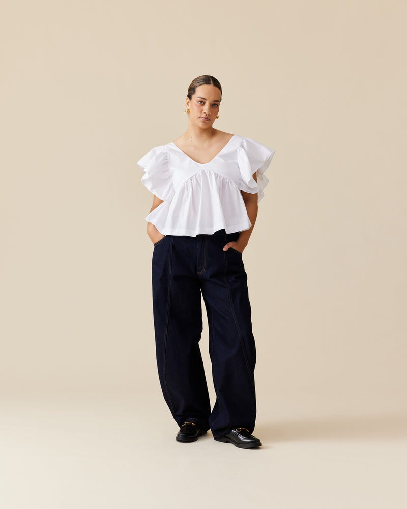 NONI RUFFLE TOP WHITE | Short sleeve cotton blouse, design with feature ruffled sleeves and a ruffle peplum hem. This top has bust shaping and a v-neckline, which makes for an easy-wear style.
