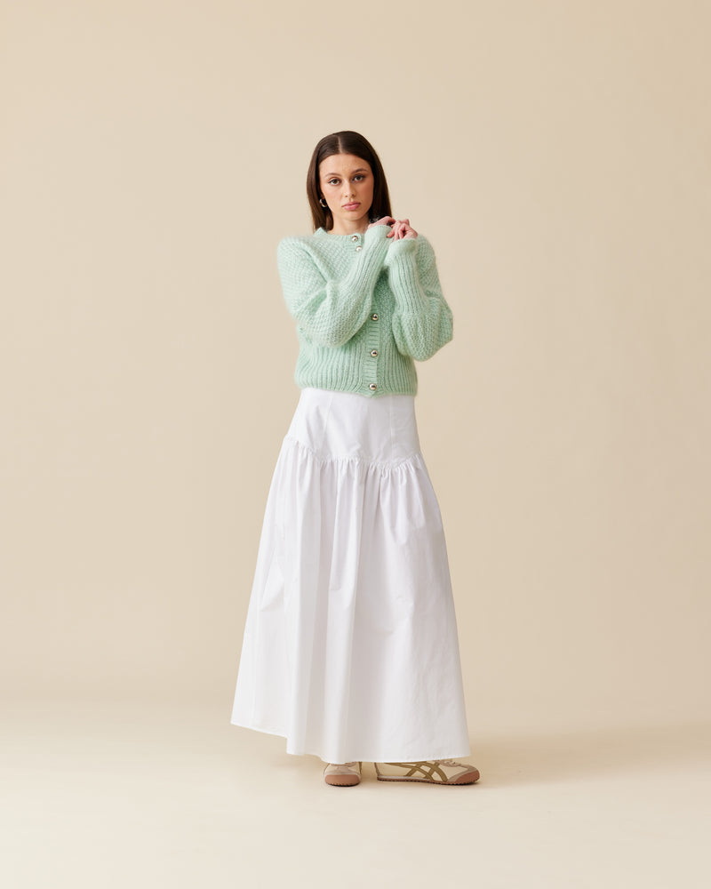 TRULLI SKIRT WHITE | Floaty basque style maxi skirt imagined in a white cotton poplin fabric. This skirt features a bodice-style waistline, that falls to a full, wide skirt.