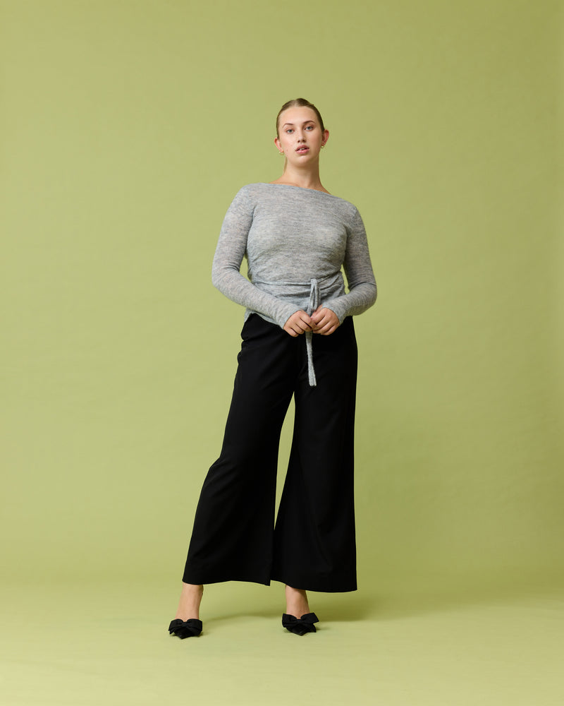 REESE PANT BLACK | Wide leg pant designed in a soft black fabric. These pants fit comfortably around the waist and fall into a relaxed wide leg shape.