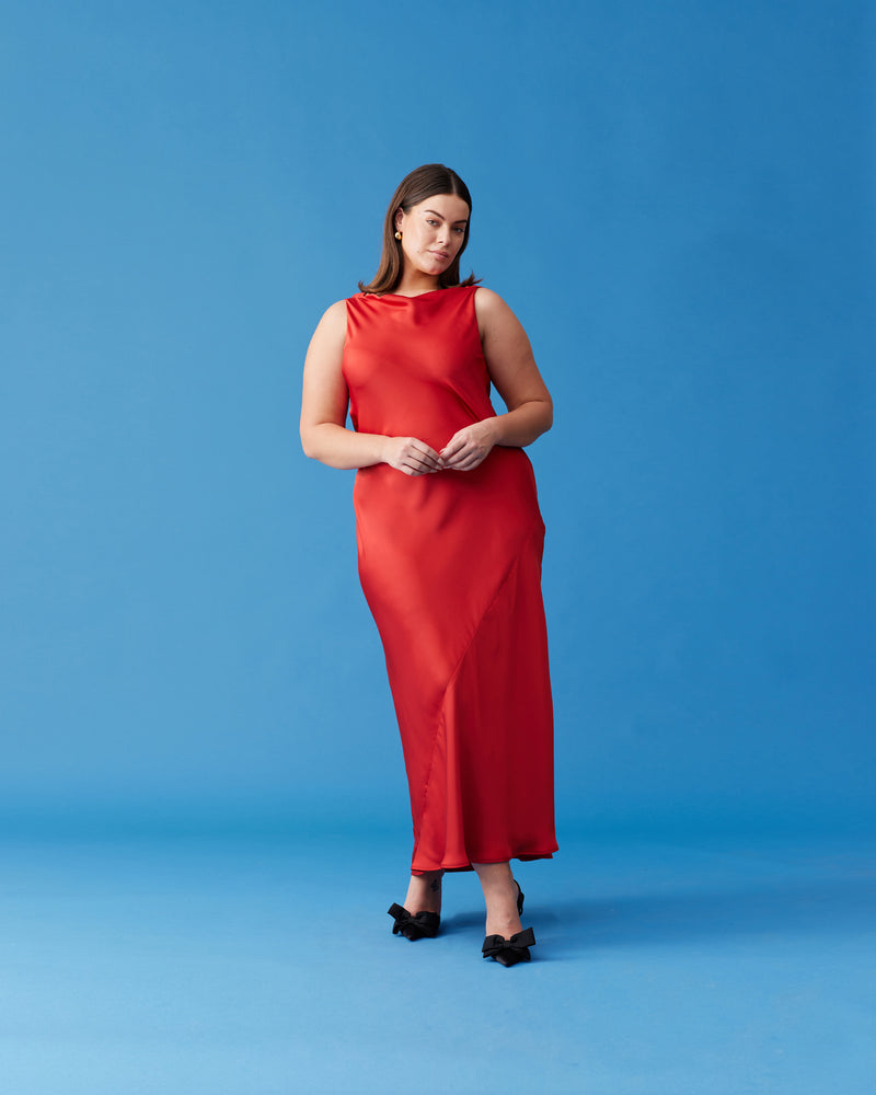 FIREBIRD COWL GOWN CHILLI | Sleeveless midi dress crafted in rich chilli satin. Features a minimal silhouette with a cowl back detail and a tie to cinch in the waist.