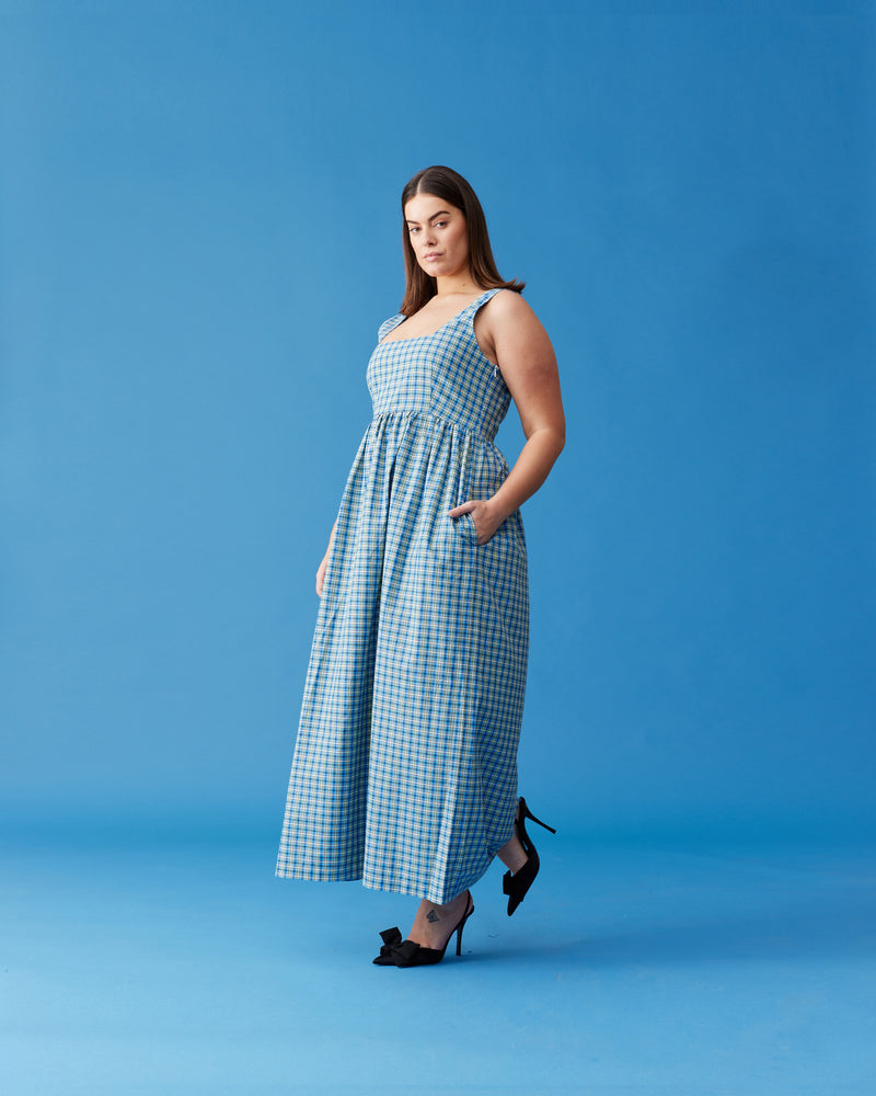 TULIP MAXI DRESS BLUE YELLOW CHECK | Tank-style maxi dress designed in blue and yellow checked cotton. This dress falls to a floaty A-line maxi skirt, and has pockets for all your essentials.
