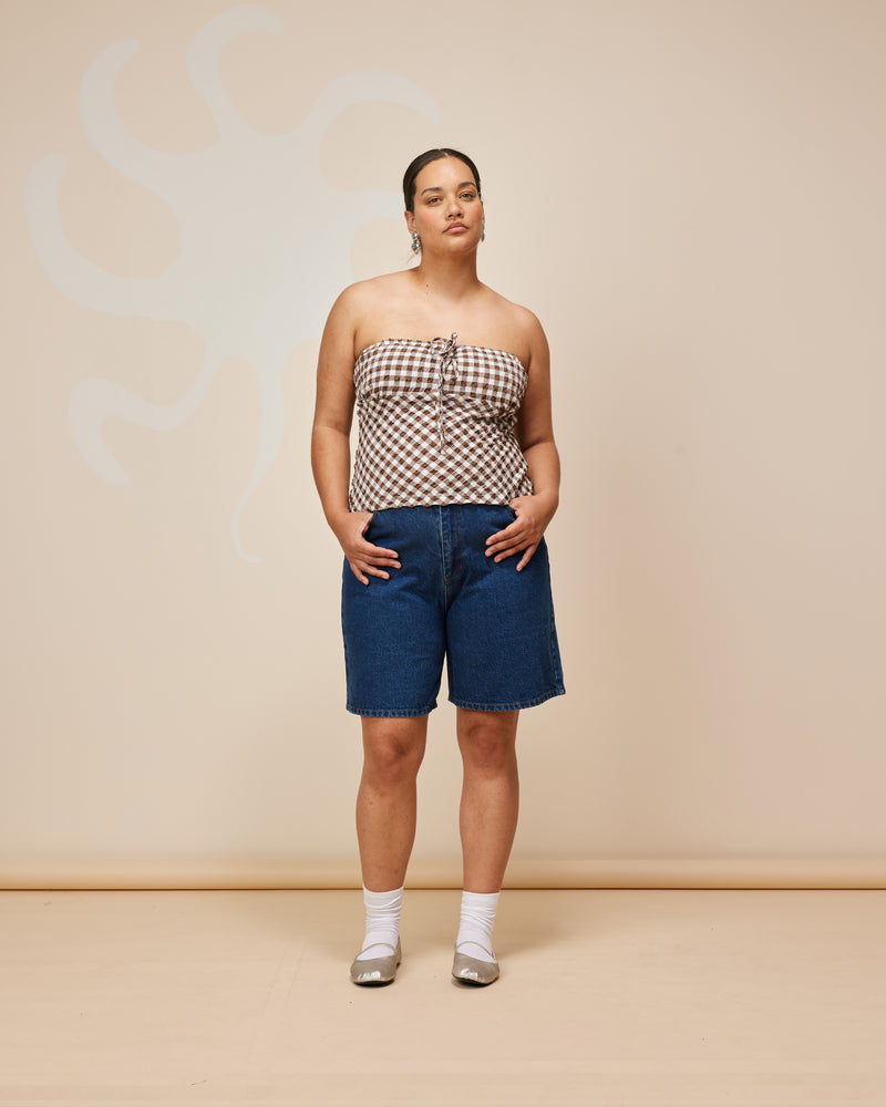 BLINK DENIM SHORT INDIGO | Vintage inspired low waisted short designed in an indigo mid-weight cotton denim. Sitting slightly A-line, this piece offers a longer length & relaxed fit.