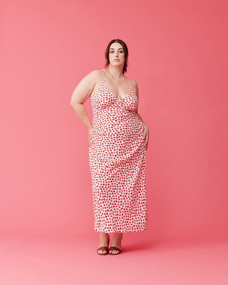 KAARINA SILK SLIP RED DAISY | Silk maxi slip dress designed in our RUBY red daisy print. This dress features gathered detailing at the bust and is cut on the bias, which means it falls beautifully...