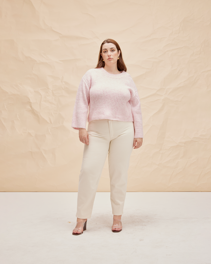 SOLAR JEAN CREAM | Straight leg relaxed fit jean with a highwaist. Features a 'heart' shape detail on the back pockets and a subtle side split at the hem.