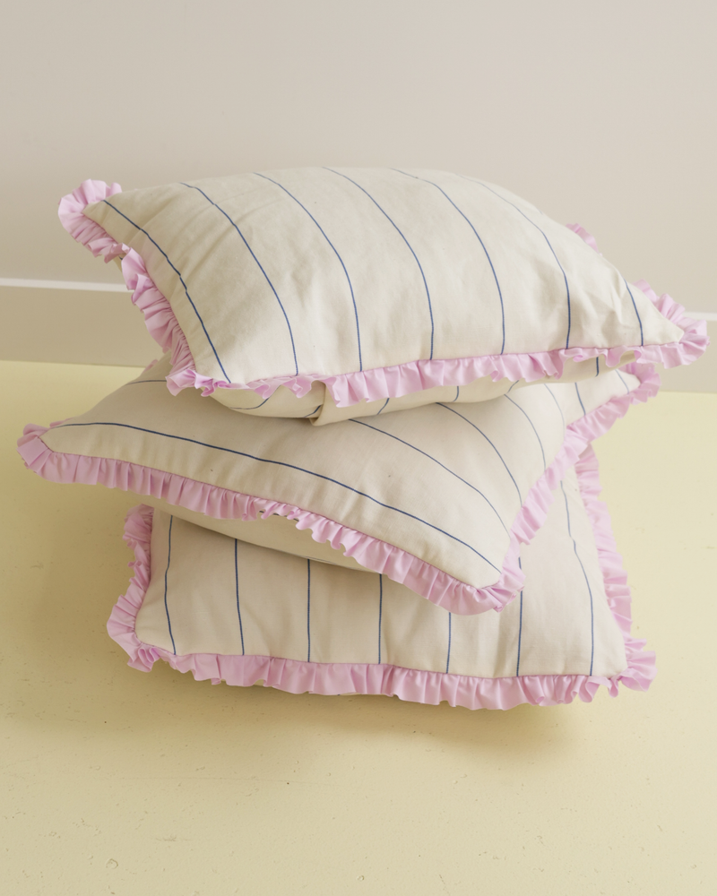 LIL RUFFLE RECYCLED CUSHION FINE STRIPE | Our very own RUBY cushions have arrived! Medium-sized decor cushion designed in a cream and navy stripe, with a feature lilac ruffle around the edge. With its neutral colouring and pop...