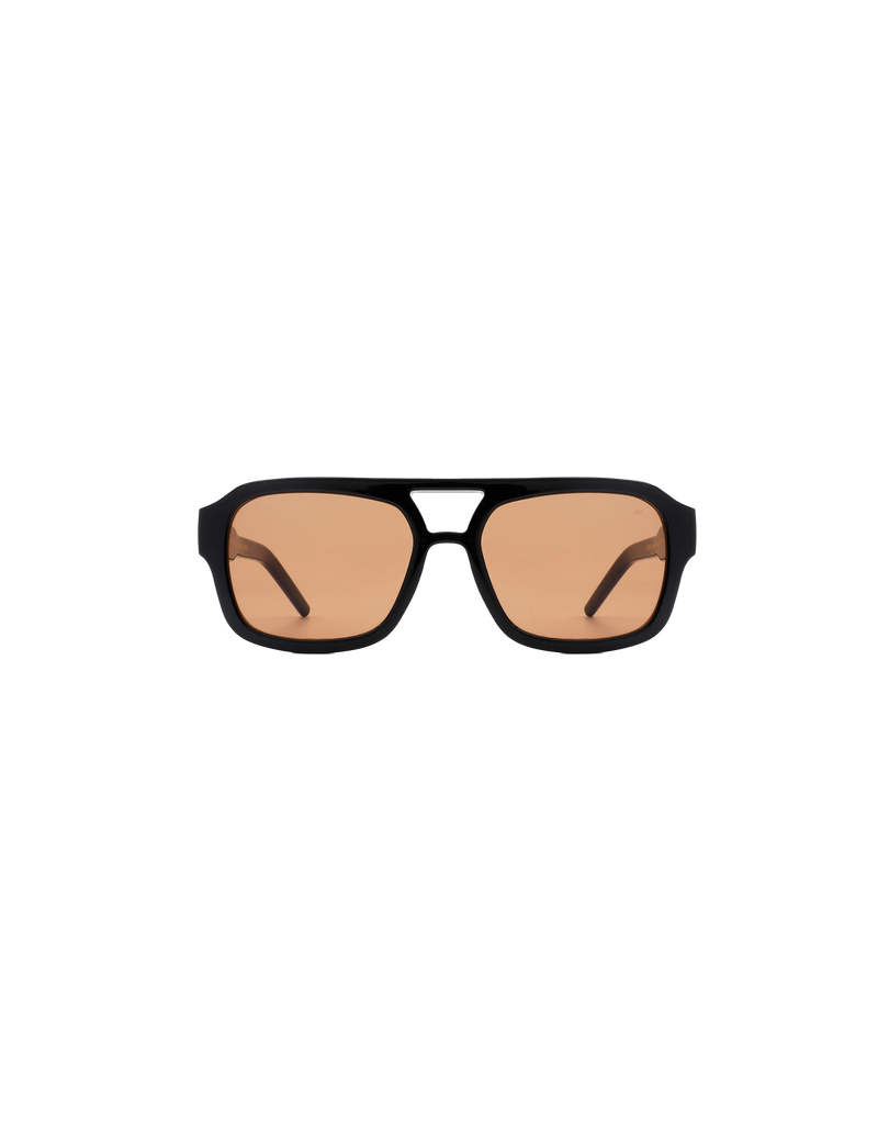 KAYA SUNGLASS BLACK | 70's inspired aviator sunglass with black frames and transparent brown lenses.