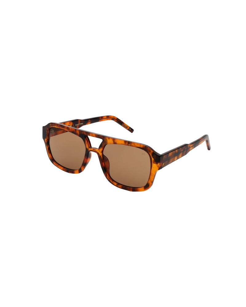 KAYA SUNGLASS HAVANA | 70's inspired aviator sunglass with tortoiseshell frames and transparent brown lenses.