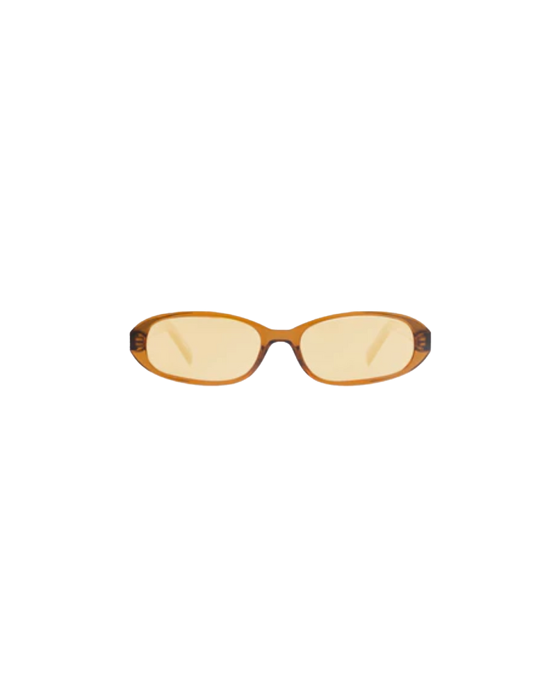 MACY SUNGLASS SMOKE | 90's inspired slim sunglass, with an oval shape lens.