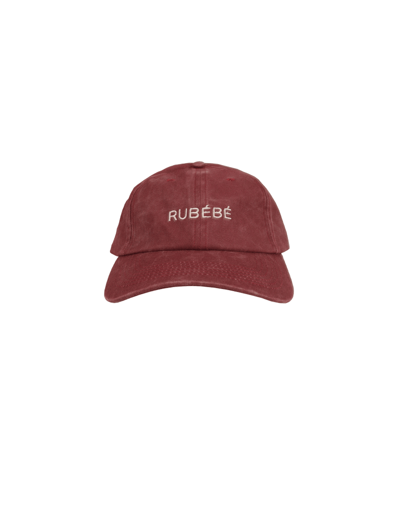 RUBEBE CAP BURGUNDY | The perfect finishing touch to any outfit, introducing our new Rubebe embroidered cap. A burgundy cotton with contrasting colour 'RUBEBE' embroidered on the front.
