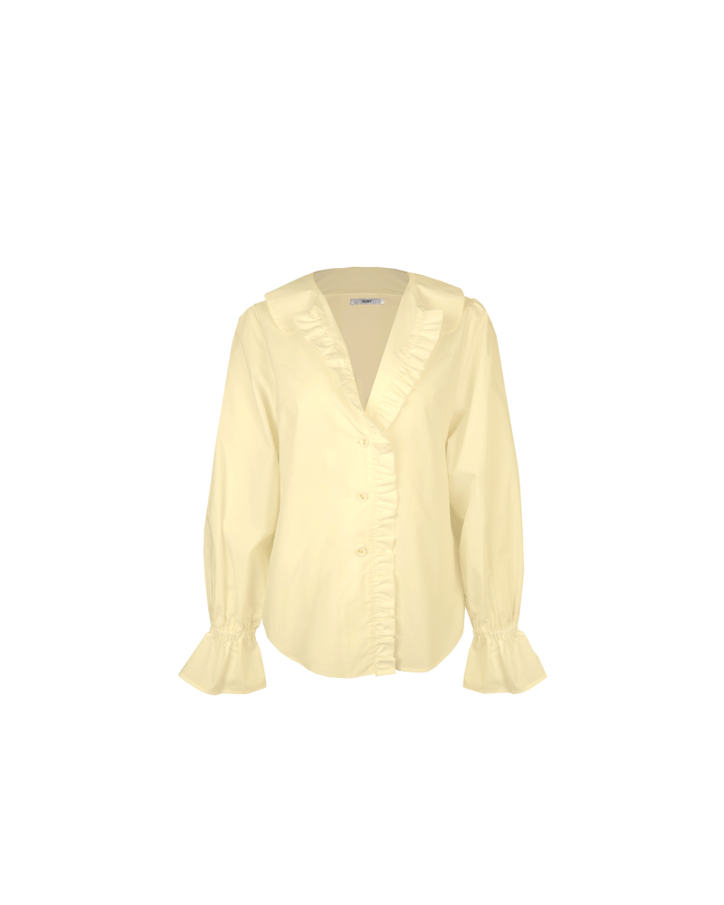 SANDLER RUFFLE SHIRT BUTTER | Long sleeve butter yellow shirt with ruffles down the placket and a rounded collar. This top features elasticated ruffle cuffs, this piece is an elevated take on the classic shirt...